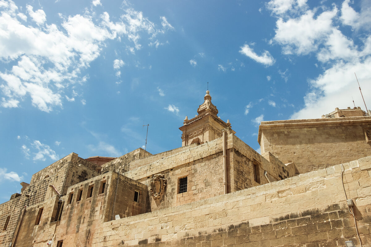 Historic limestone buildings and fortifications of the Citadel in Victoria, Gozo